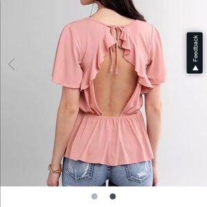 Buckle open back ruffle top